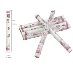 Burning moxa sticks emitting warm therapeutic smoke