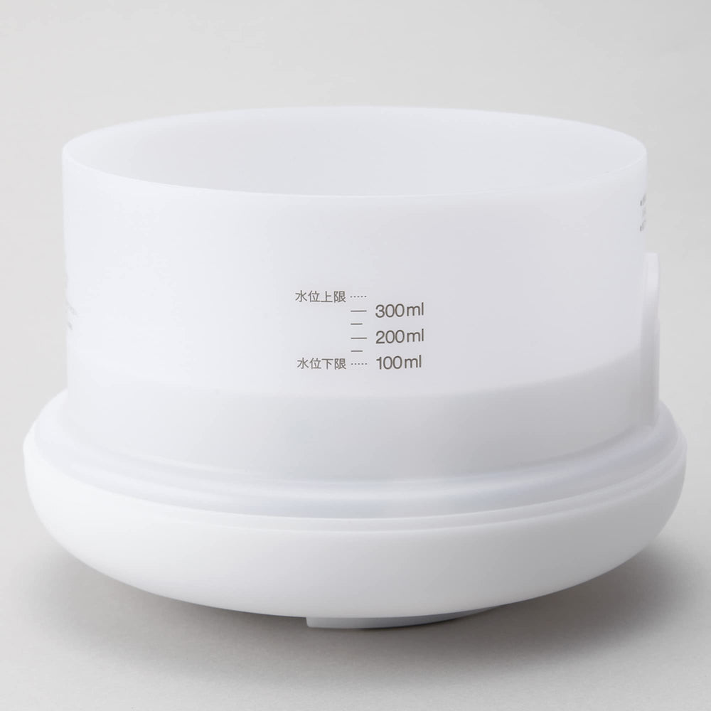 Muji MJ-UAD1 diffuser with light on for night use and mood lighting