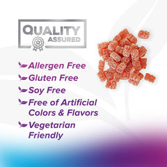 Two chewable multivitamin gummies with a glass of water