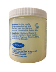 Hair applying Murray's Cocosoft Coconut Oil with coconut aroma