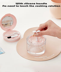 Extractor and brush included with pink denture case