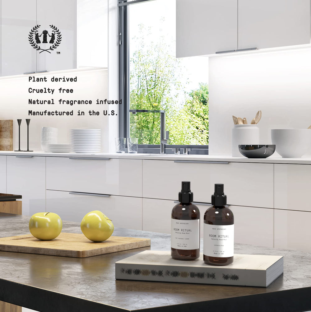 Mist being spritzed from Muse Apothecary Room Ritual bottle