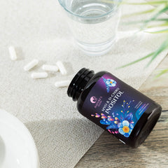Product shot with bottle and capsules on white background