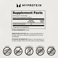 Flat lay of Myprotein Creatine Monohydrate Powder and scoop