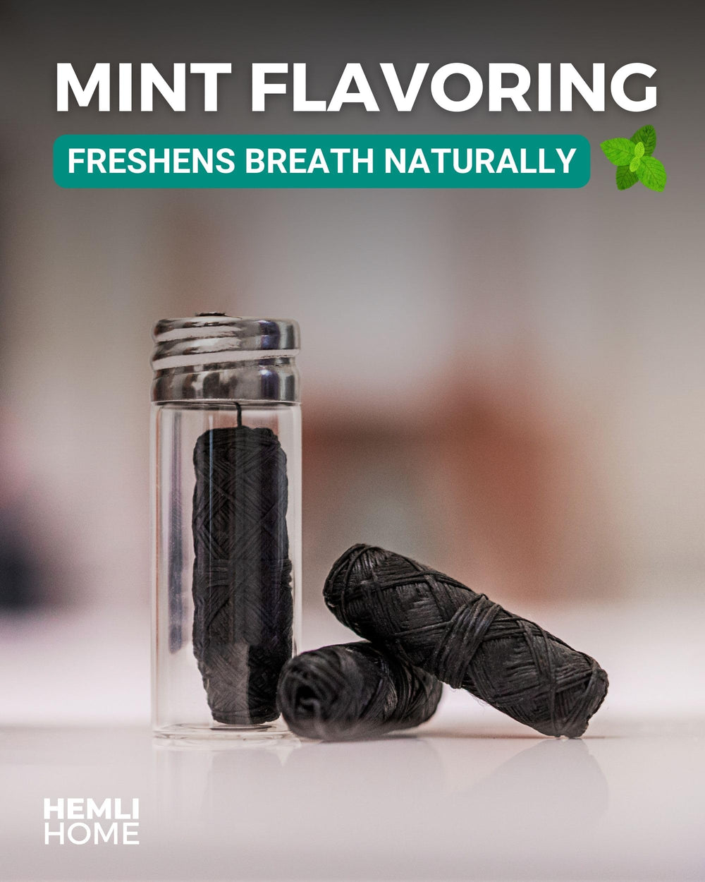 Activated charcoal floss with mint-candelilla wax