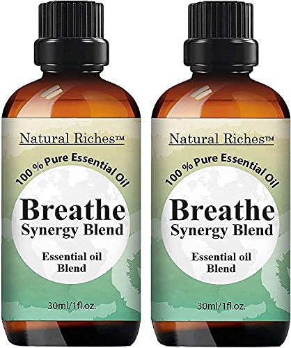 Bottle of Natural Riches Breathe Essential Oil Blend with peppermint and eucalyptus notes