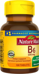 Tablets ready for morning routine in Nature Made B-6 bottle for energy support.