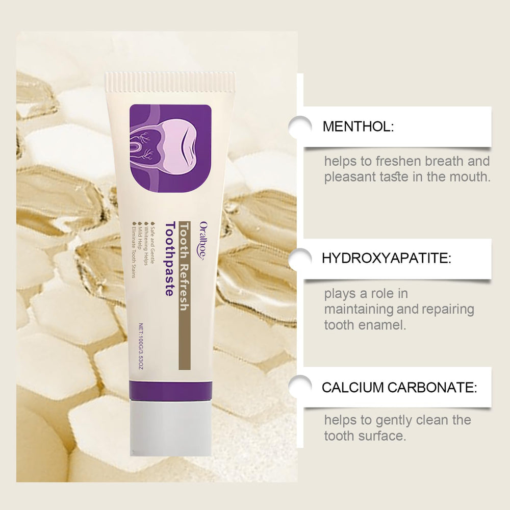 Mint leaves beside Nature Tooth Refresh toothpaste on white background