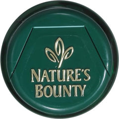 Natural B-12 tablets shown in hand