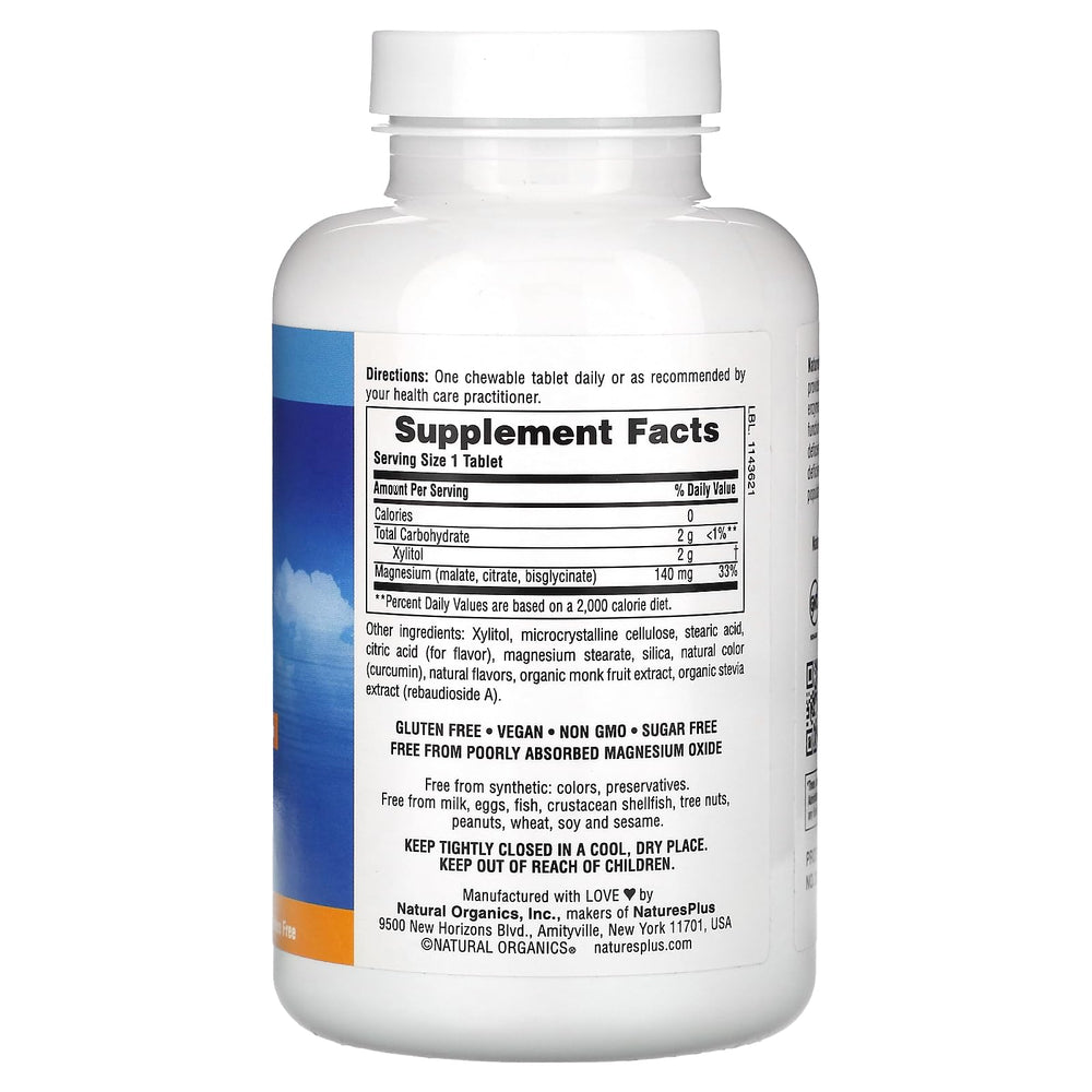 Close-up of NaturesPlus KalmAssure Magnesium Chewable Orange tablets