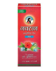 Navratna Cool Oil applied as scalp massage