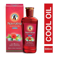 Close-up of Navratna Cool Oil ingredients: Bringraaj, Brahmi, Amla