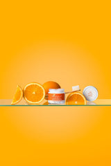 Close-up of Nelson Naturals Citrus Spice Blend toothpaste in a glass jar.