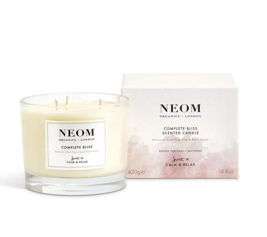 NEOM Complete Bliss 3-wick candle with blush rose, lime and black pepper for calming ambiance.