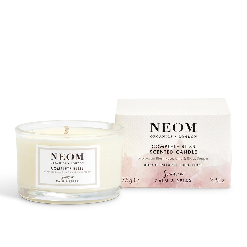NEOM Complete Bliss travel candle pours a calming blend of blush rose, lime and pepper.