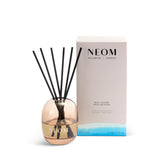Amber glass vessel of NEOM Real Luxury Reed Diffuser 100ml