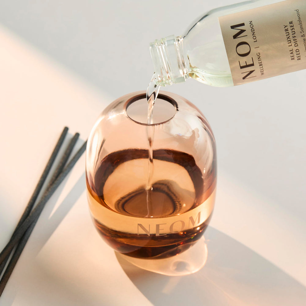 Reeds inserted into NEOM reed diffuser