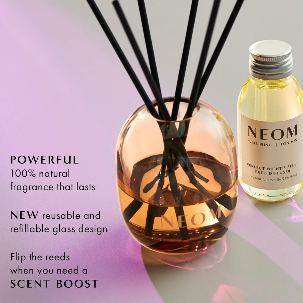 Reeds inserted in diffuser to release fragrance