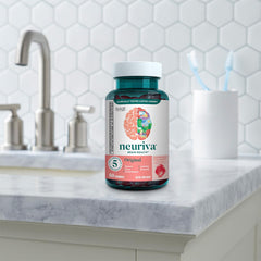 Close-up of NEURIVA strawberry-flavored brain health gummies
