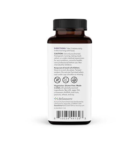 Close-up of NeuroQ Daily Essentials tablets beside the bottle