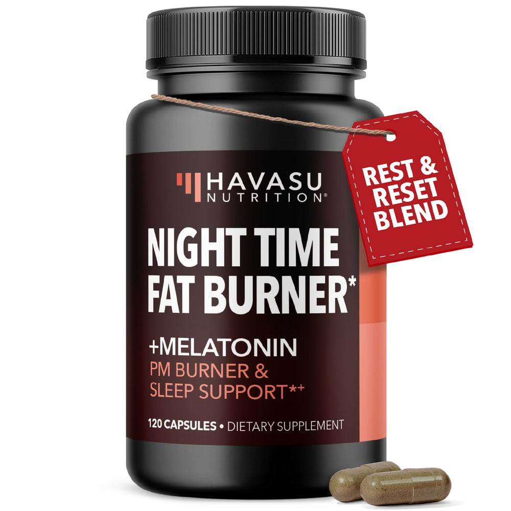 Night Time Fat Burner bottle and capsules on a dark background