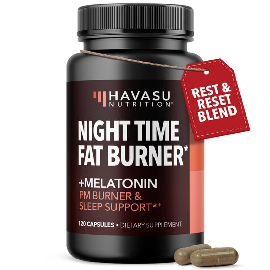 Night Time Fat Burner bottle and capsules on a dark background