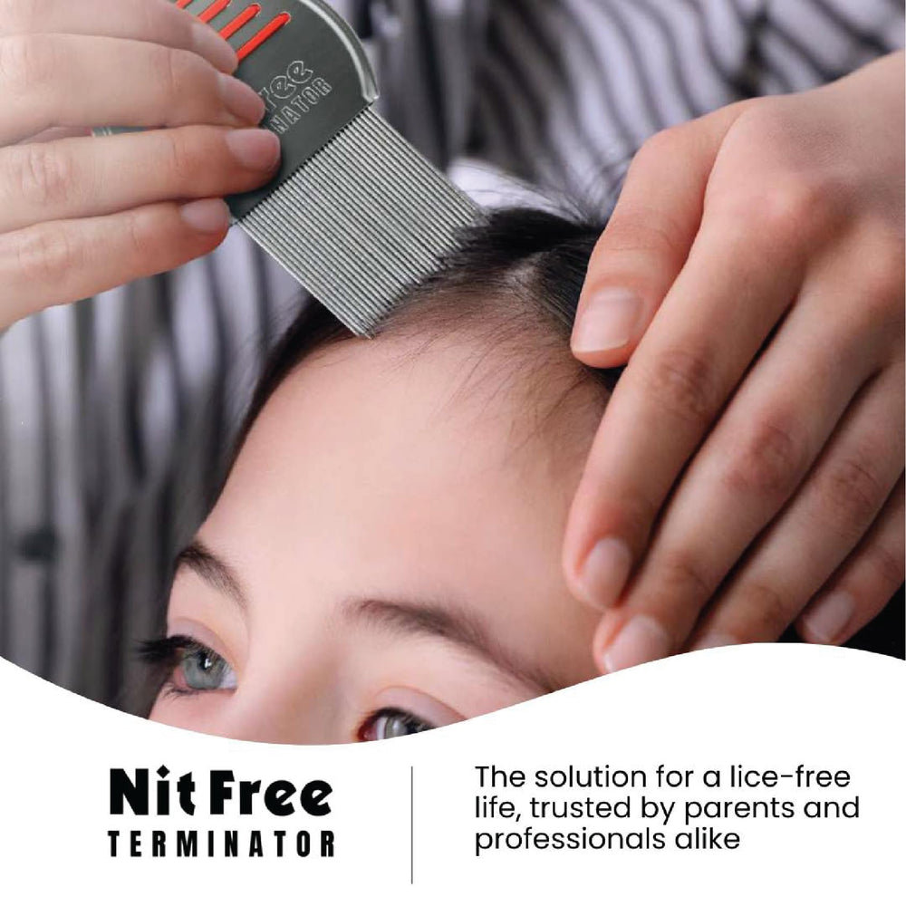 Nit Free Terminator comb in hand showing silver color and comfortable grip
