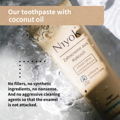 Vegan and organic badges on Niyok toothpaste packaging
