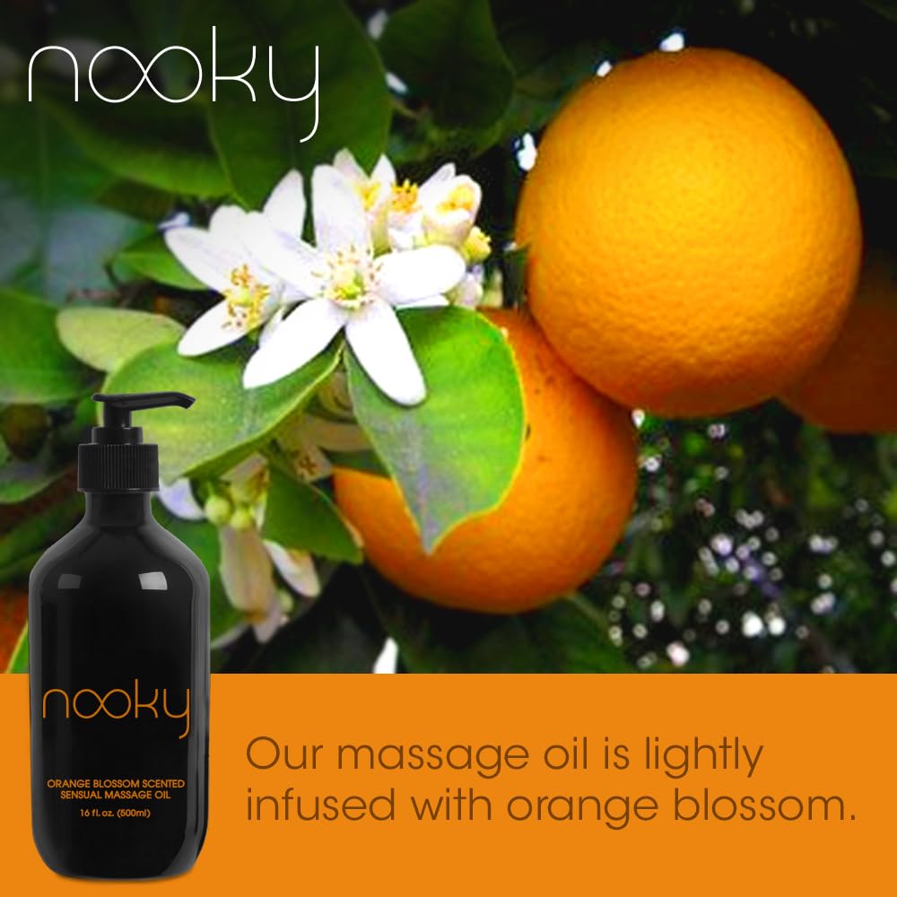 Hand applying Nooky Orange Blossom Massage Oil during a massage