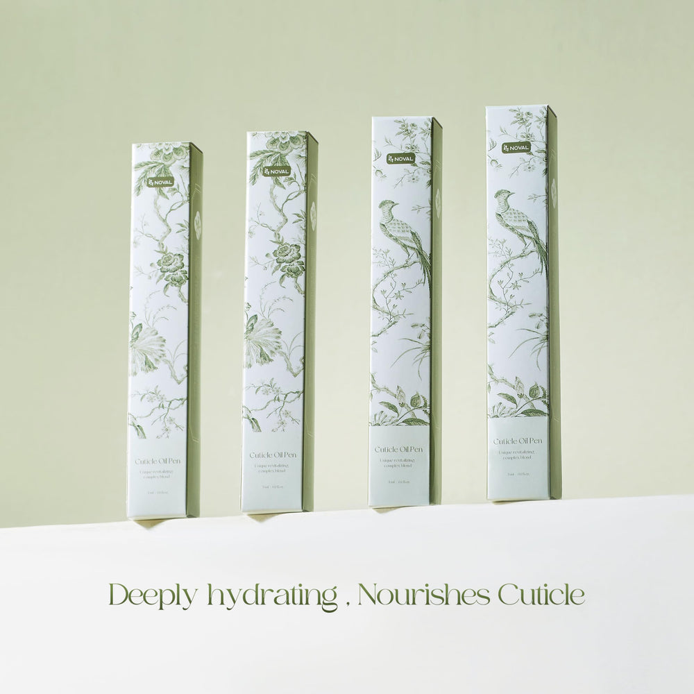 NOVAL cuticle oil pens twist-click application on nail edge close-up
