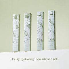 NOVAL cuticle oil pens twist-click application on nail edge close-up