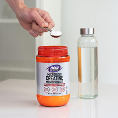 Micronized creatine powder dissolving in water