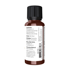 Close-up of lavender essential oil in glass bottle