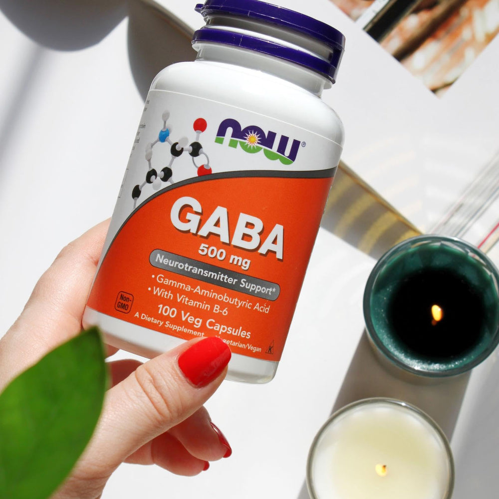 NOW Gaba 500mg capsules spilling from bottle