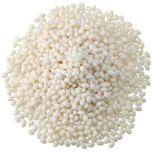 Nuanchu 100g bead teeth pellets in a white dish for DIY tooth filling