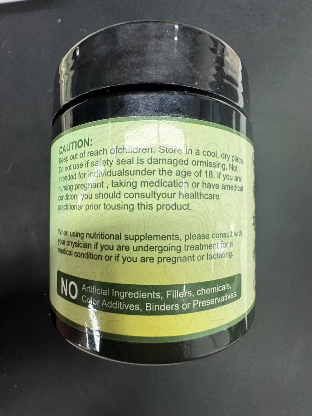 Nukupuns Soursop Capsules capsules in hand for easy daily use
