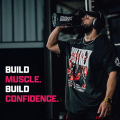 Scoop of Strawberry Watermelon flavored creatine powder dissolving in water