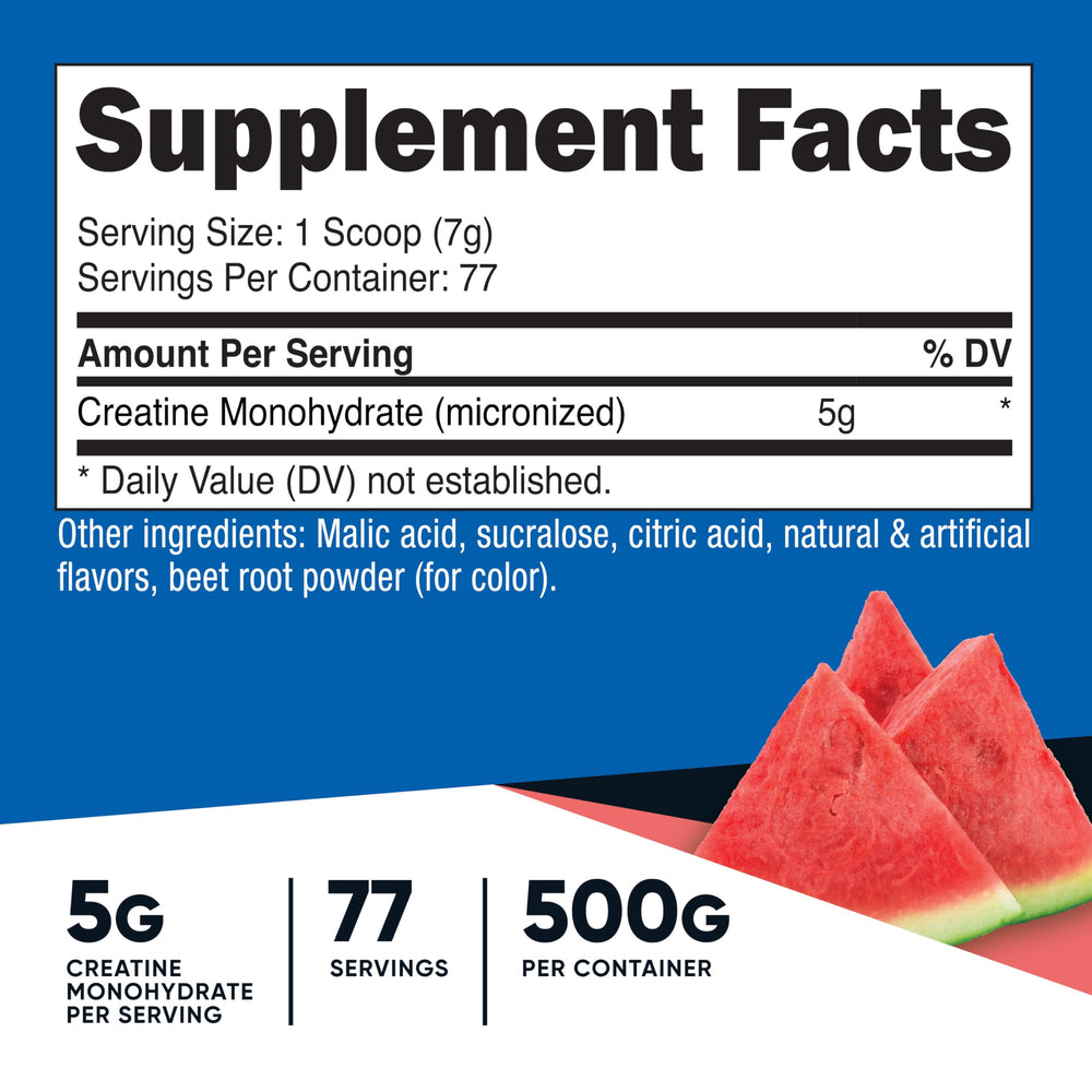 Measuring scoop with watermelon flavored creatine monohydrate powder