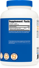 Lifestyle shot of Nutricost Magnesium Complex with gym accessories
