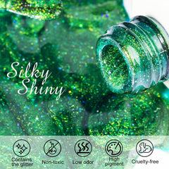 NXJ INFILILA Galaxy Glow cat-eye polish swatch highlighting olive-green glitter and depth.