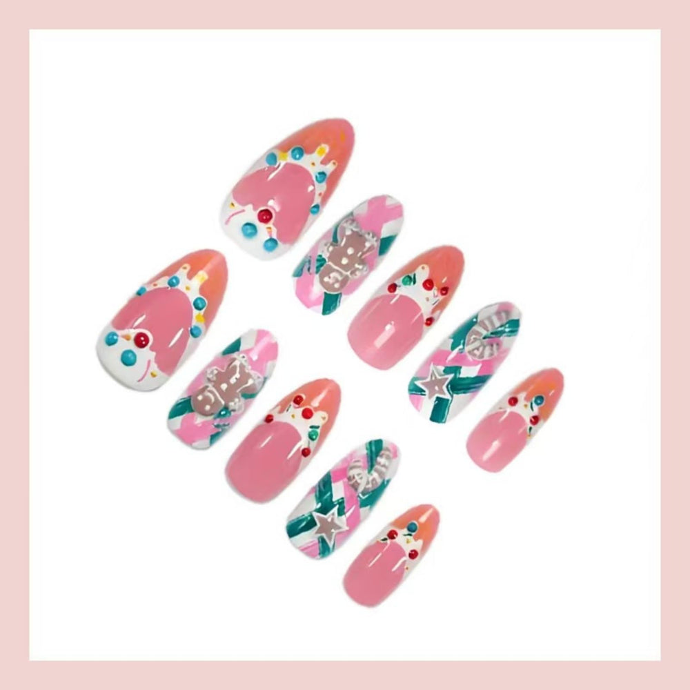 Nxtpz Rhinestone‑decorated gingerbread nails sparkle at holiday events
