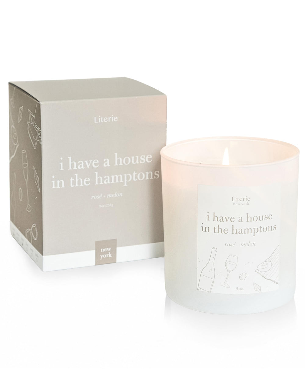 9oz NYC-inspired candle featuring rose and melon fragrance in a glass jar