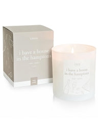 9oz NYC-inspired candle featuring rose and melon fragrance in a glass jar