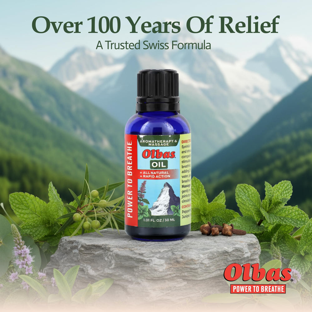 Therapeutic massage scene with Olbas Oil branding