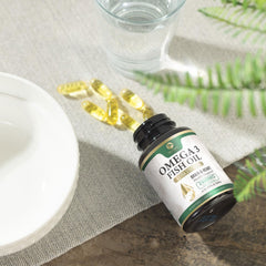 Lifestyle scene with omega 3 bottle and lemon