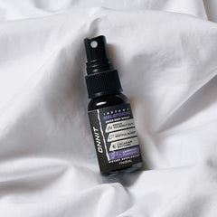 Application action of melatonin spray being used