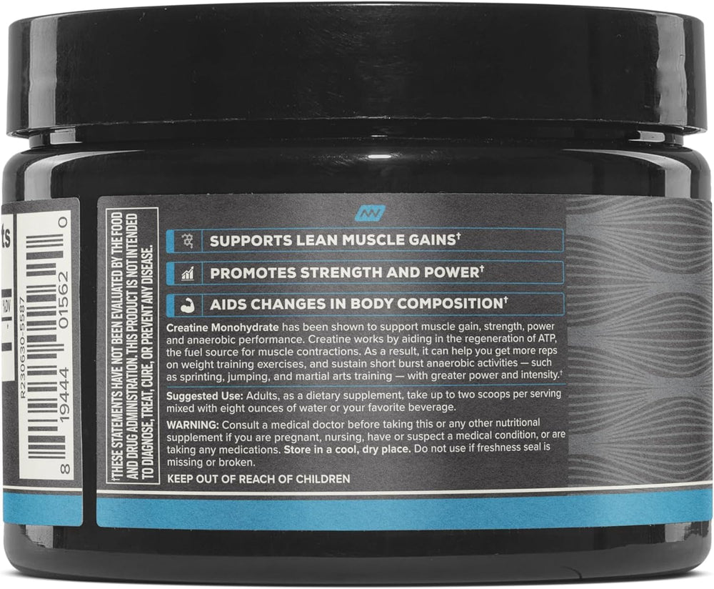 Athlete mixing creatine powder in shaker bottle