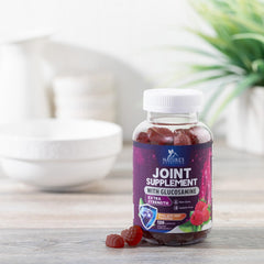 Open bottle of joint support gummies