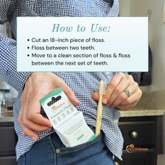 Floss gliding between teeth to reach tight spaces