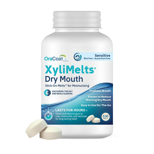 OraCoat XyliMelts dry mouth relief discs adhered to teeth